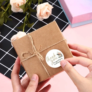 Floral thank you labels on kraft gift box for small business packaging and decoration