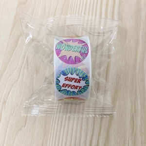 Detail of colorful round reward stickers for kids featuring wonderful and super effort text