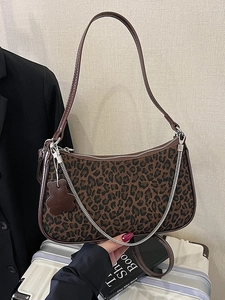 Vintage leopard print shoulder bag with silver chain and cute bear charm pendant