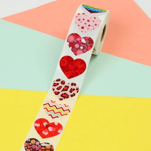 Roll of 1 inch heart stickers with various colorful patterns for gift decoration