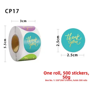 Detailed view of 500 gold foil Thank You stickers in purple, blue, and green on 1-inch rolls