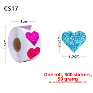 Macro detail of holographic heart stickers showing exact 2.5cm size dimensions in a roll