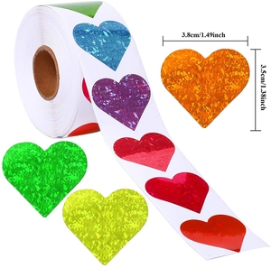 Roll of heart-shaped laser holographic stickers with colorful glass texture for gift sealing