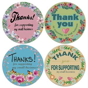 Floral Thank You roll stickers with birds and butterfly motifs for business packaging