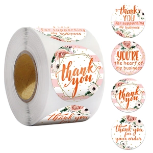 Floral roll of thank you stickers with rose patterns for small business packaging