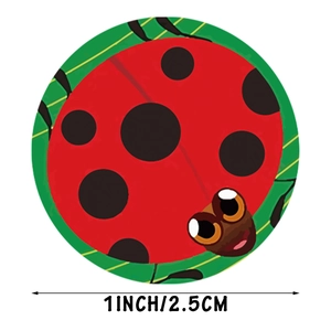 Roll of 1-inch cartoon ladybug reward stickers with red and black polka dot design
