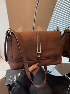 Vintage brown suede shoulder bag with gold metal buckle for women in autumn casual style