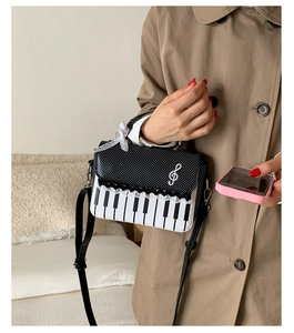 Chic piano keyboard mini bag with polka dot flap and music note detail