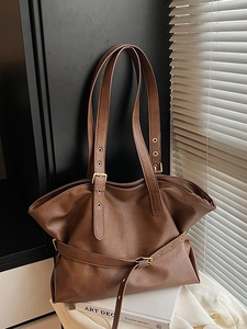 Retro brown large capacity tote bag with adjustable straps and decorative buckle design
