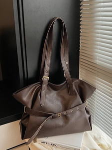 Vintage dark brown large tote bag with buckle details and shoulder strap for commute