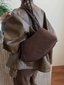 Vintage dark brown crescent shoulder bag made of high-quality matte suede and smooth leather