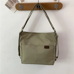 Waterproof green nylon tote bag with large capacity and stylish front pockets