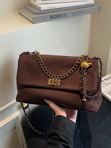 Deep brown matte suede chain underarm bag with gold hardware and vintage postman flap design