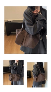 Detailed views of dark brown suede tote bag with side buckles and matching pouch set