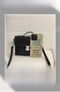 Detail showing mini black PU square bag size comparison with silver metal buckle
