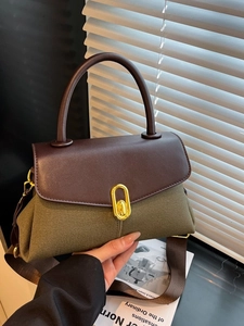 Vintage olive canvas and brown leather tote bag with gold oval twist lock closure