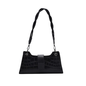 Modern black crocodile pattern shoulder bag with unique braided handle on white background