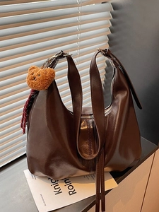 Brown oil wax leather large hobo bag with a cute bear charm for daily commuting