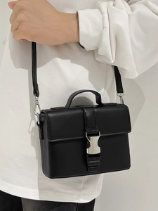 Minimalist black PU leather crossbody bag with silver buckle and top handle for women