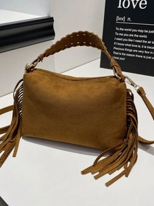 Caramel suede hobo bag with fringe details and woven handle for women's autumn style