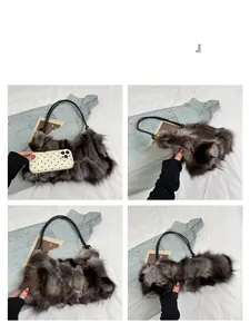 Detailed view of grey faux fur shoulder bag with black handle and size comparison