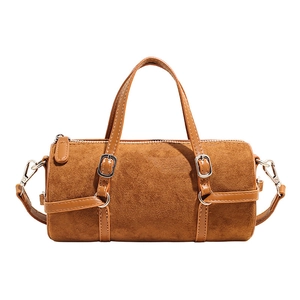 Minimalist caramel brown cylindrical tote bag in suede and smooth leather for women