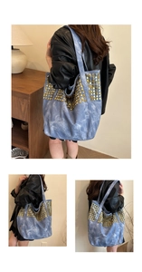 Détails du sac fourre-tout en denim bleu délavé avec rivets dorés de style vintage