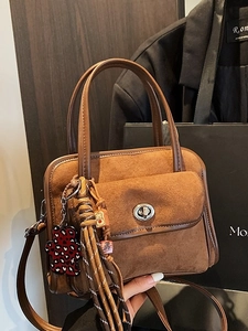 Brown retro suede bowling handbag with metal twist lock and cute teddy bear charms