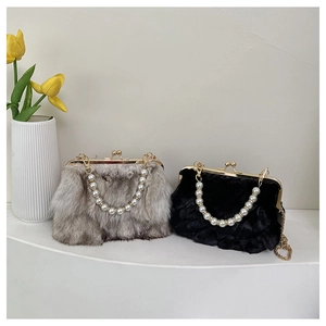 Close-up of faux fox fur bags with oversized pearl handles and golden clasp closures