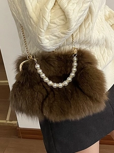 Brown fluffy faux fox fur crossbody bag with large pearl handle and gold chain strap