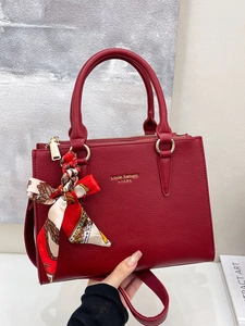 Elegant wine red leather bridal handbag with floral silk scarf and gold hardware
