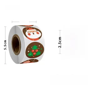Detail of 2.5cm Christmas roll stickers featuring Santa Claus and holly berry designs