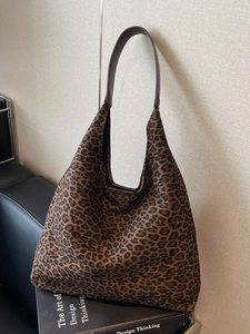 Chic leopard print oversized tote bag with premium brown leather straps for autumn fashion