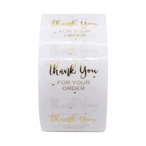 Roll of white and gold Thank You For Your Order adhesive labels for gift packaging