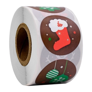 Roll of Christmas decorative adhesive stickers with reindeer and tree patterns