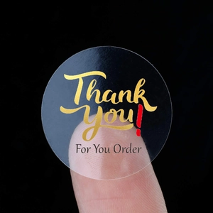 Roll of transparent gold foil Thank You stickers for gift wrapping and packaging
