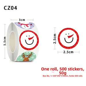 Detail of 2.5cm Christmas sticker roll showing 500 adhesive labels with festive patterns