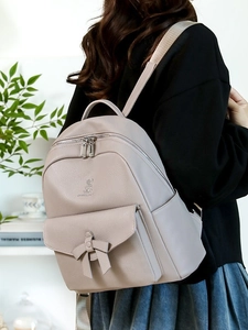 Zaino beige da donna in morbida pelle PU con fiocco e dettaglio logo a coniglio
