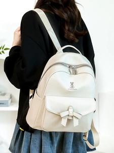Zaino da donna in pelle PU crema con fiocco decorativo e grande capacità per il pendolarismo