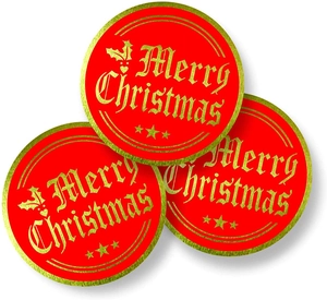 Close-up of red and gold Merry Christmas stickers with metallic foil festive lettering