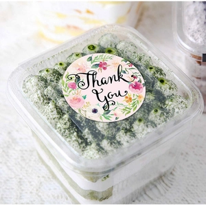 Floral Thank You stickers on a roll for envelope sealing and decorative packaging label