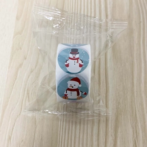 Détails de rouleaux d'autocollants de bonhomme de neige de Noël sous film plastique