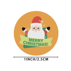 Round Christmas sticker roll with Santa Claus holding a Merry Christmas banner, 1-inch size
