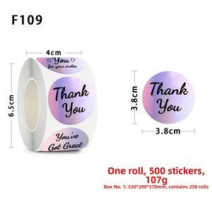 Macro detail of rainbow holographic Thank You stickers on roll with 3.8cm diameter