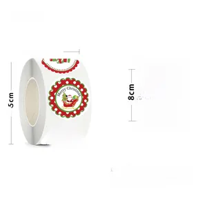 Close-up of 3.8cm Christmas roll stickers with Santa Claus and Merry Christmas text