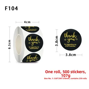 Detail of 1.5 inch black and gold Thank You stickers showing roll and single label size