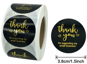 Detail of 1.5 inch black and gold foil thank you stickers for small business packaging
