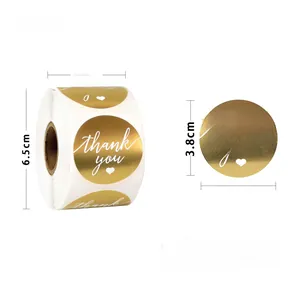 Macro view of 1.5 inch gold Thank You stickers with dimensions for gift packaging