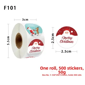 Detail view of 2.5cm Christmas stickers roll with Santa and Reindeer holiday motifs