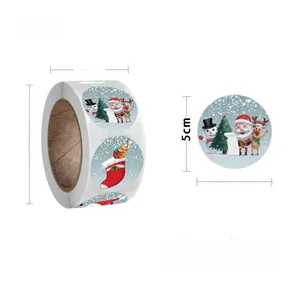 Close-up of 2.5cm Christmas stickers roll featuring Santa, snowman and reindeer designs